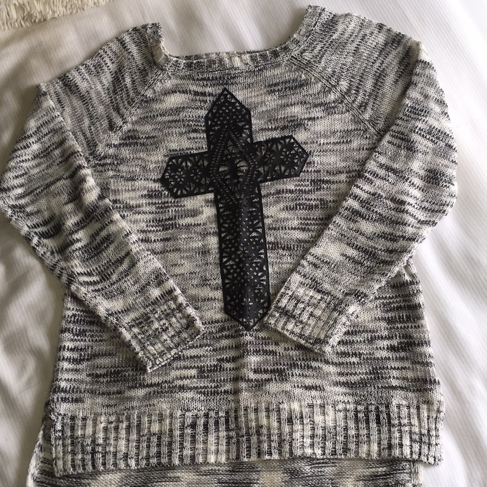 Cross sweater